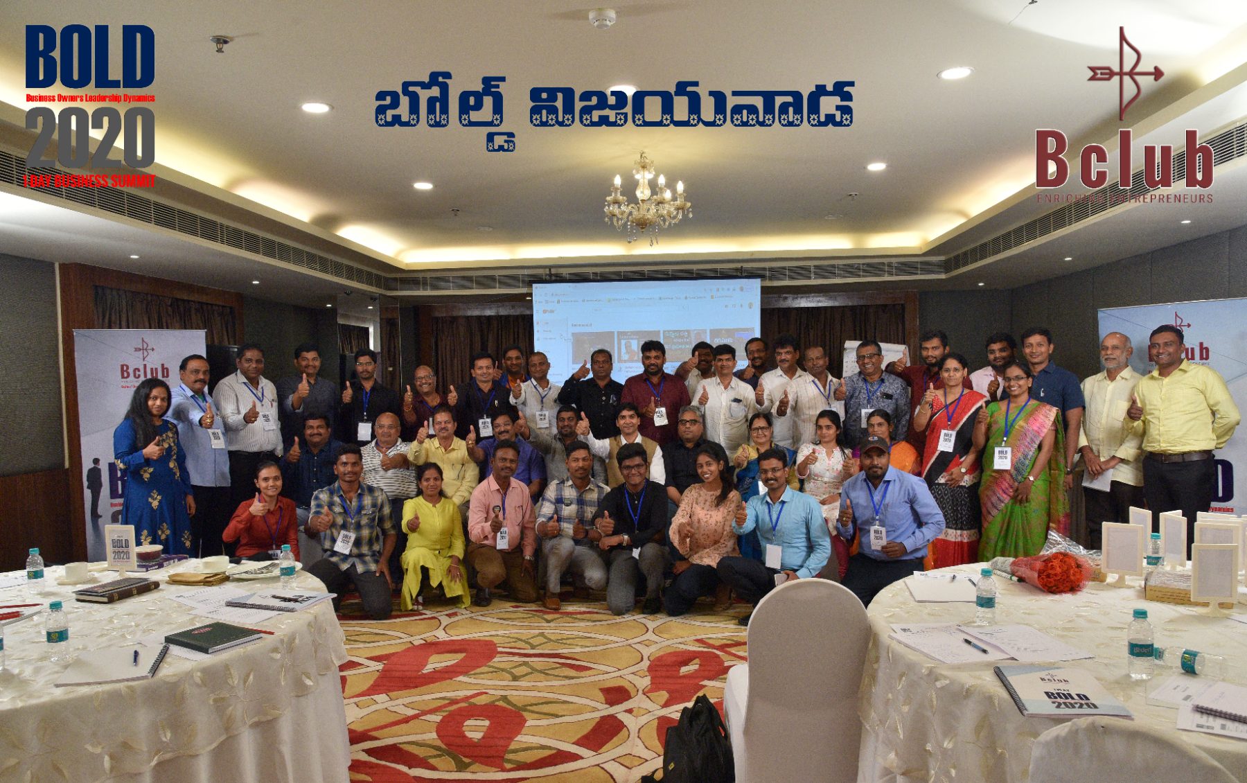 Attendees gathered for a group photograph at the end of a program