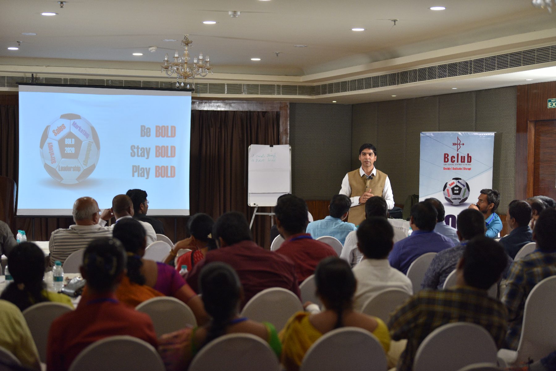 A full room at one of Venu Bhagavan's live programs