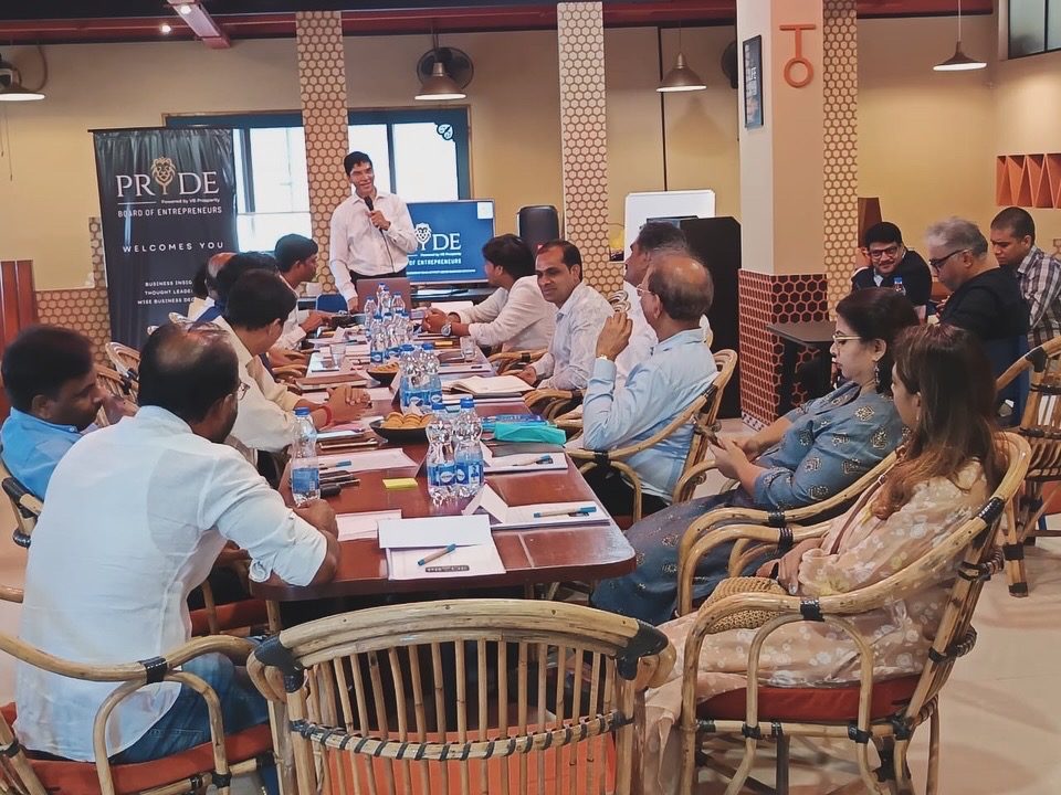 A small group session around one table